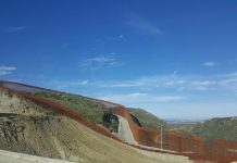 México: de expulsor de migrantes a receptor involuntario Muro fronterizo